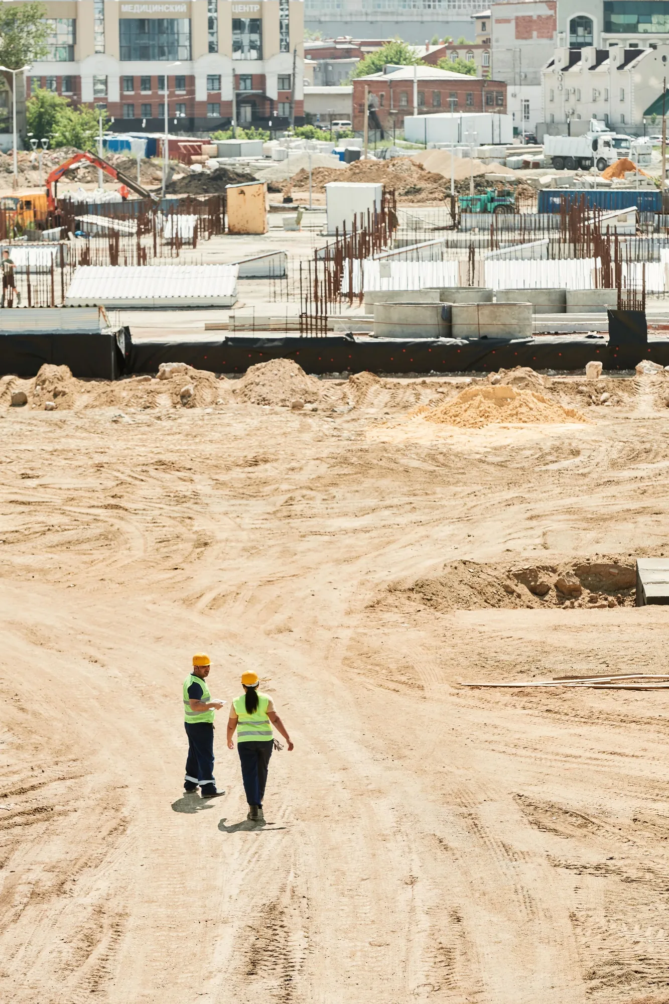 active construction site photographed from an aerial drone perspective