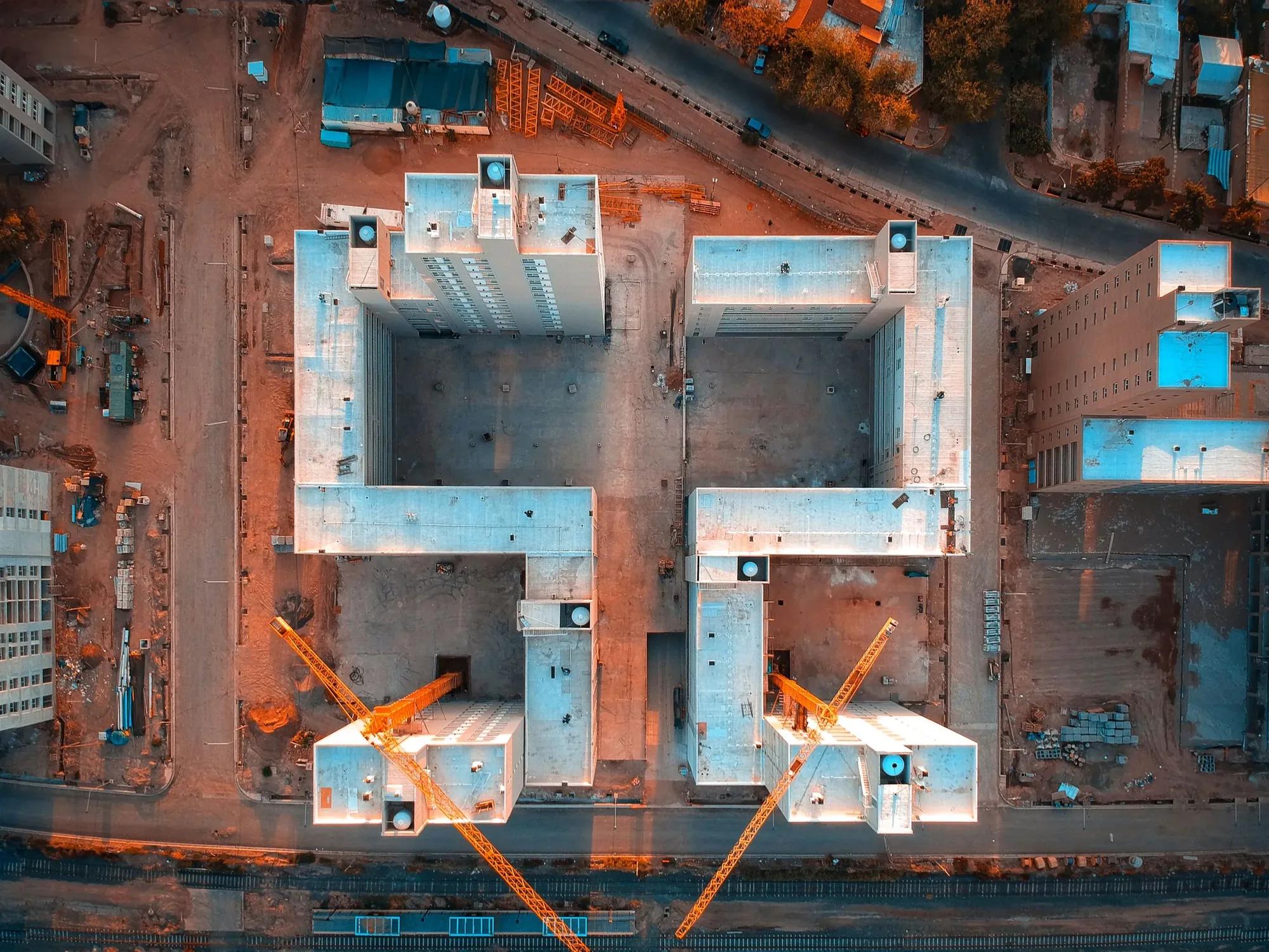 active construction site photographed from an aerial drone perspective
