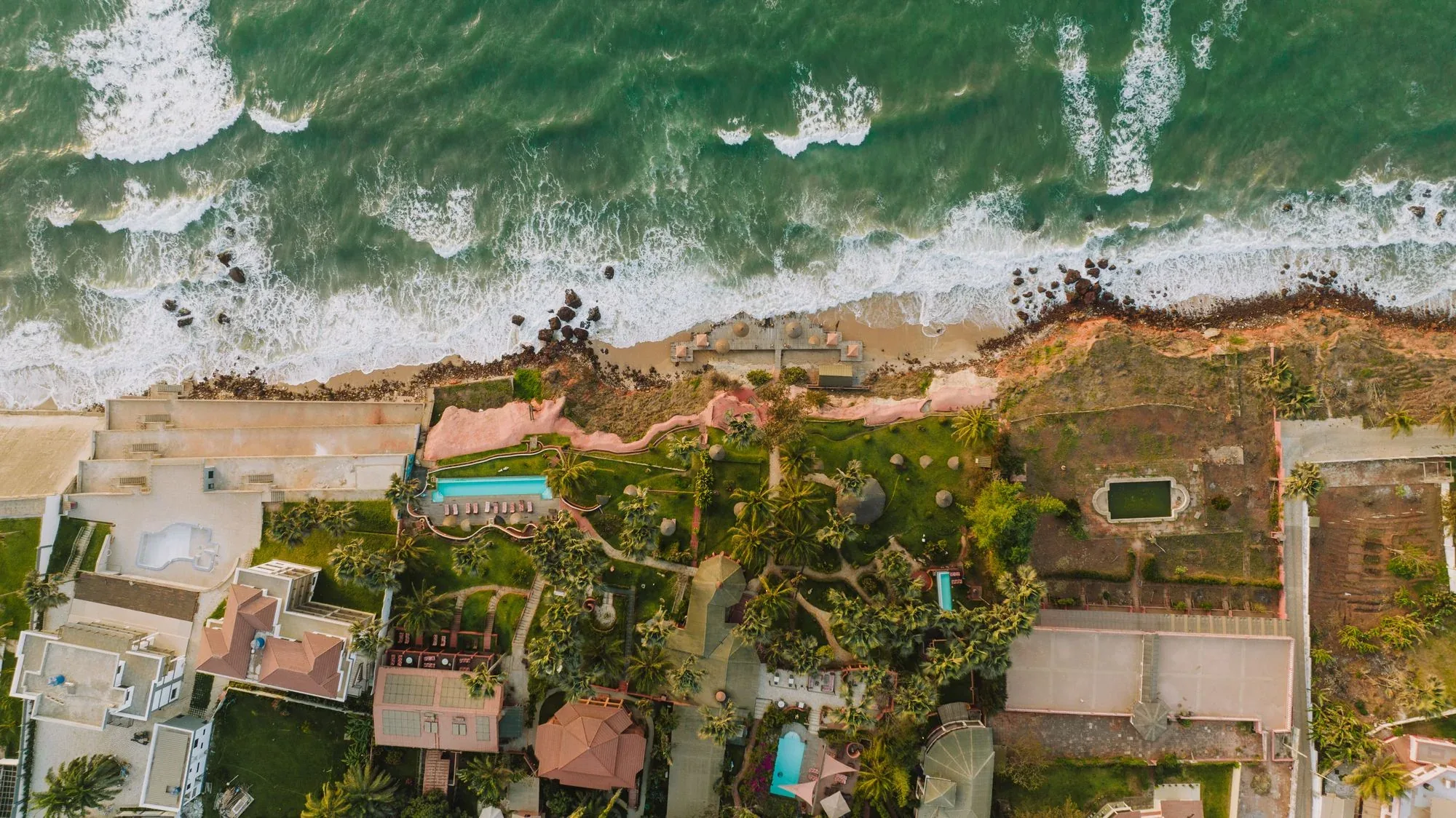 property and surrounding context photographed from an aerial drone perspective